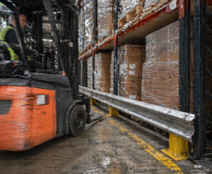 Armco barrier next to a forklift
